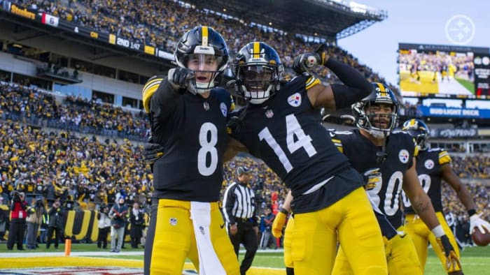 Pittsburg Steelers QB Kenny Pickett poses after a touchdown with teammate George Pickens who Pickett believes can develop into one of the NFL’s top receivers.